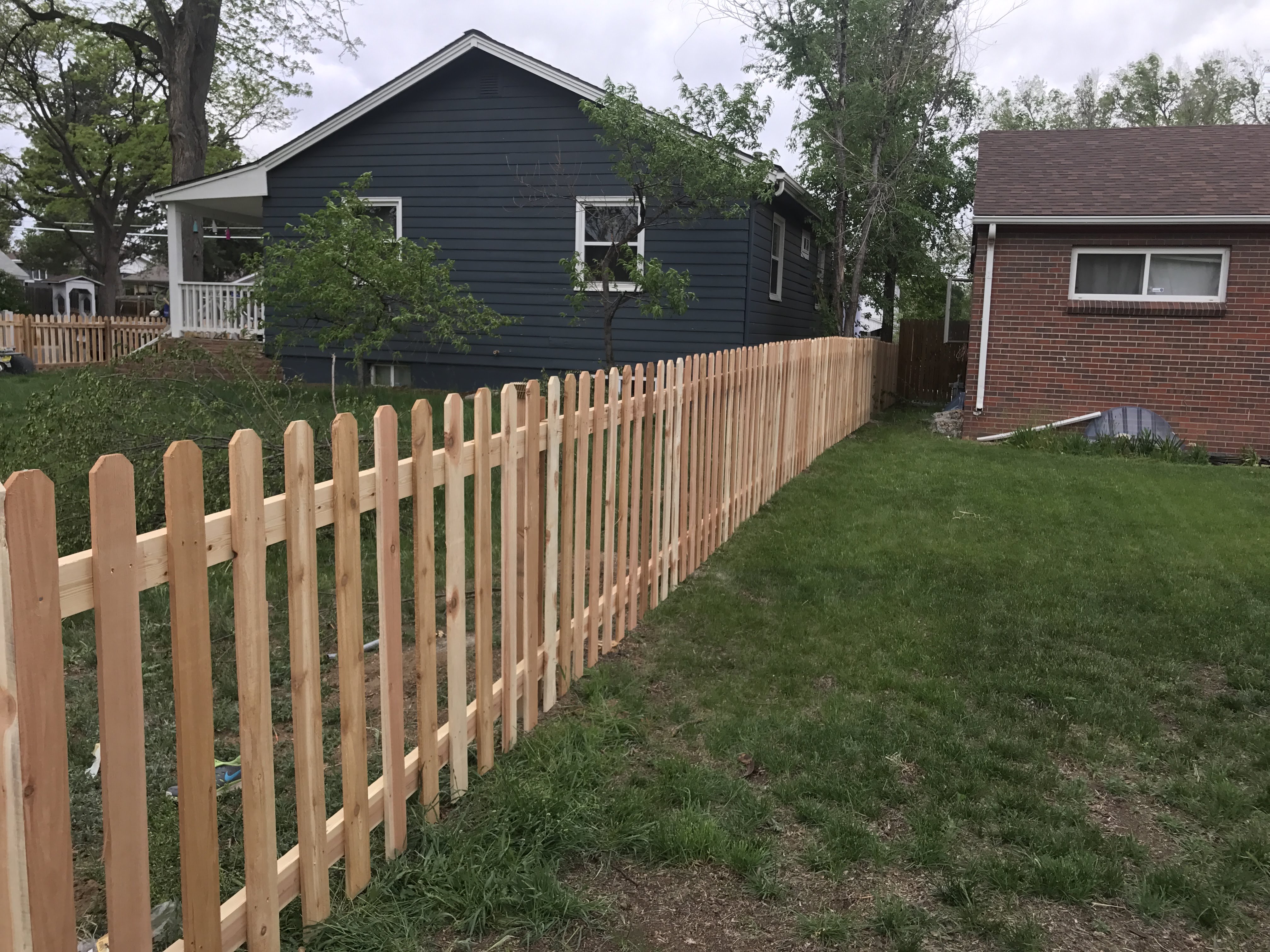 Fencing Questions Answered - What is the difference
                        between vinyl and wood?