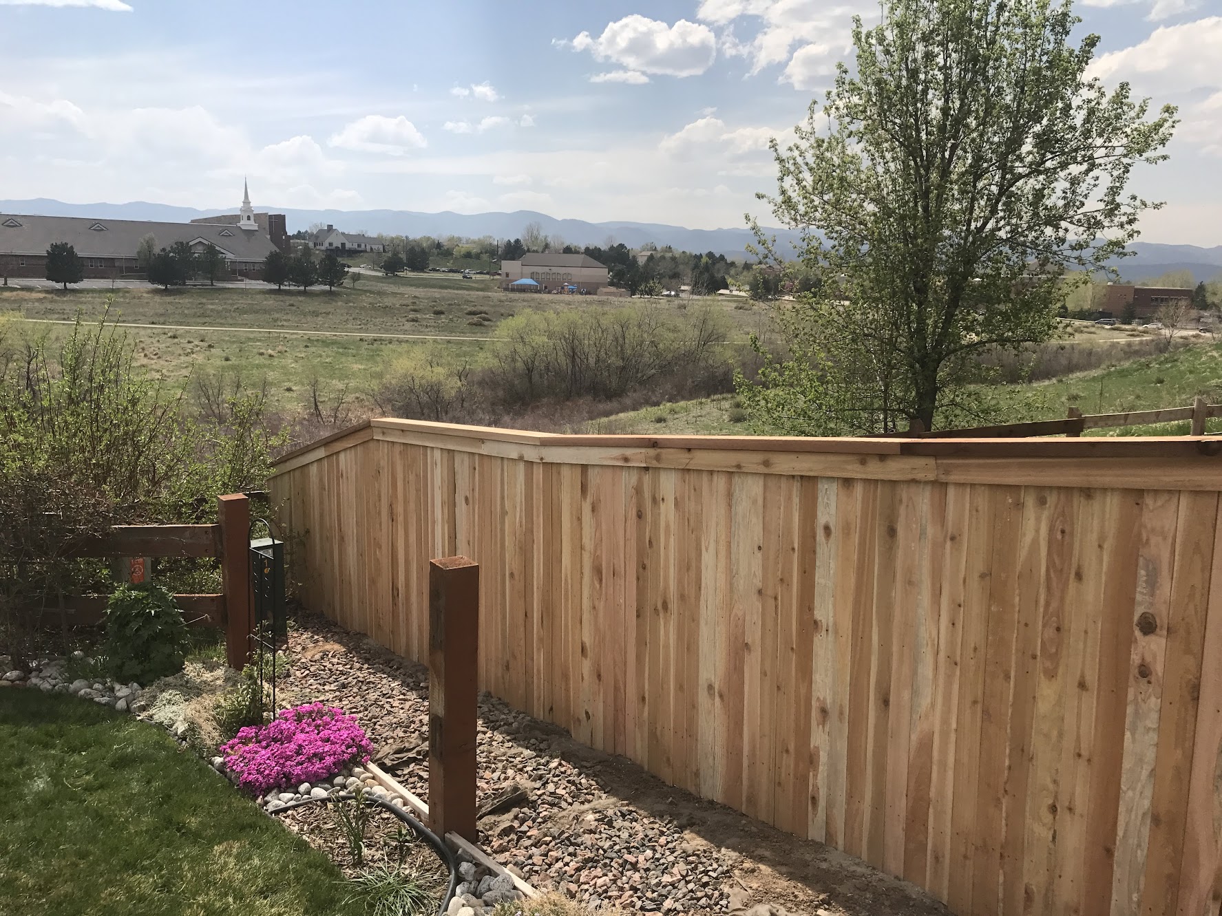 Wooden privacy fence with mountain view in Colorado Springs