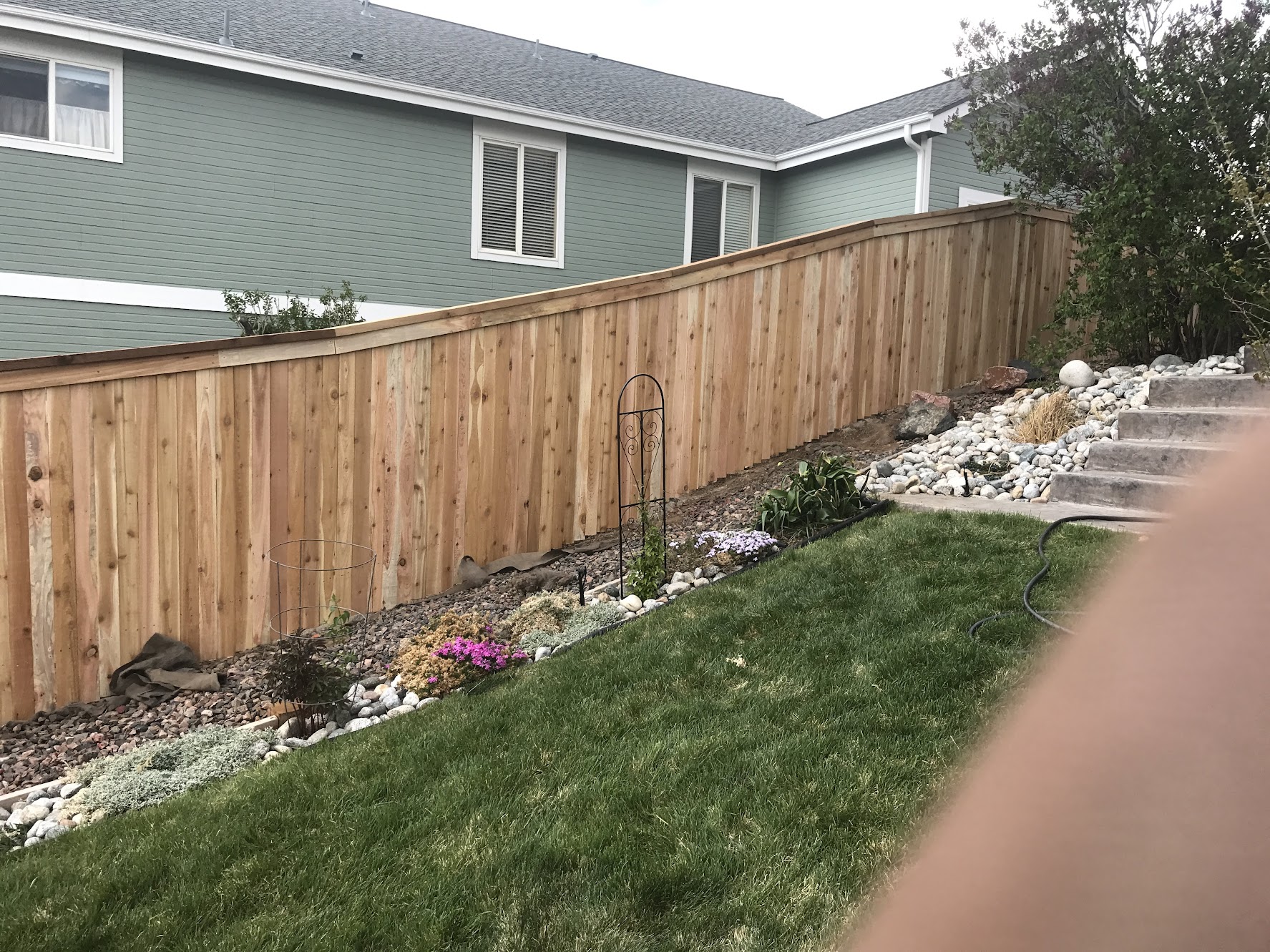 Wooden privacy fence with landscaping in Colorado Springs
